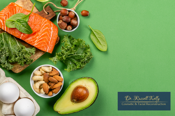 Healthy foods like salmon, nuts, and leafy greens that boost gum health in Orange, CA