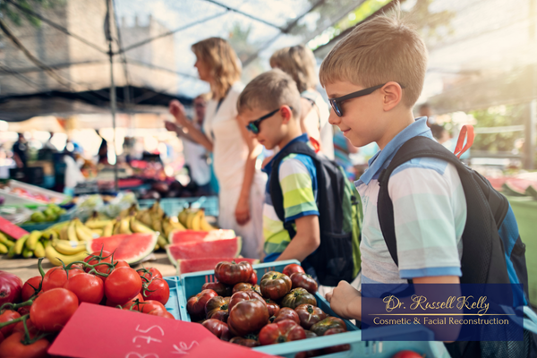 Orange, CA family choosing fresh produce to support gum health with Dr. Russell Kelly’s tips